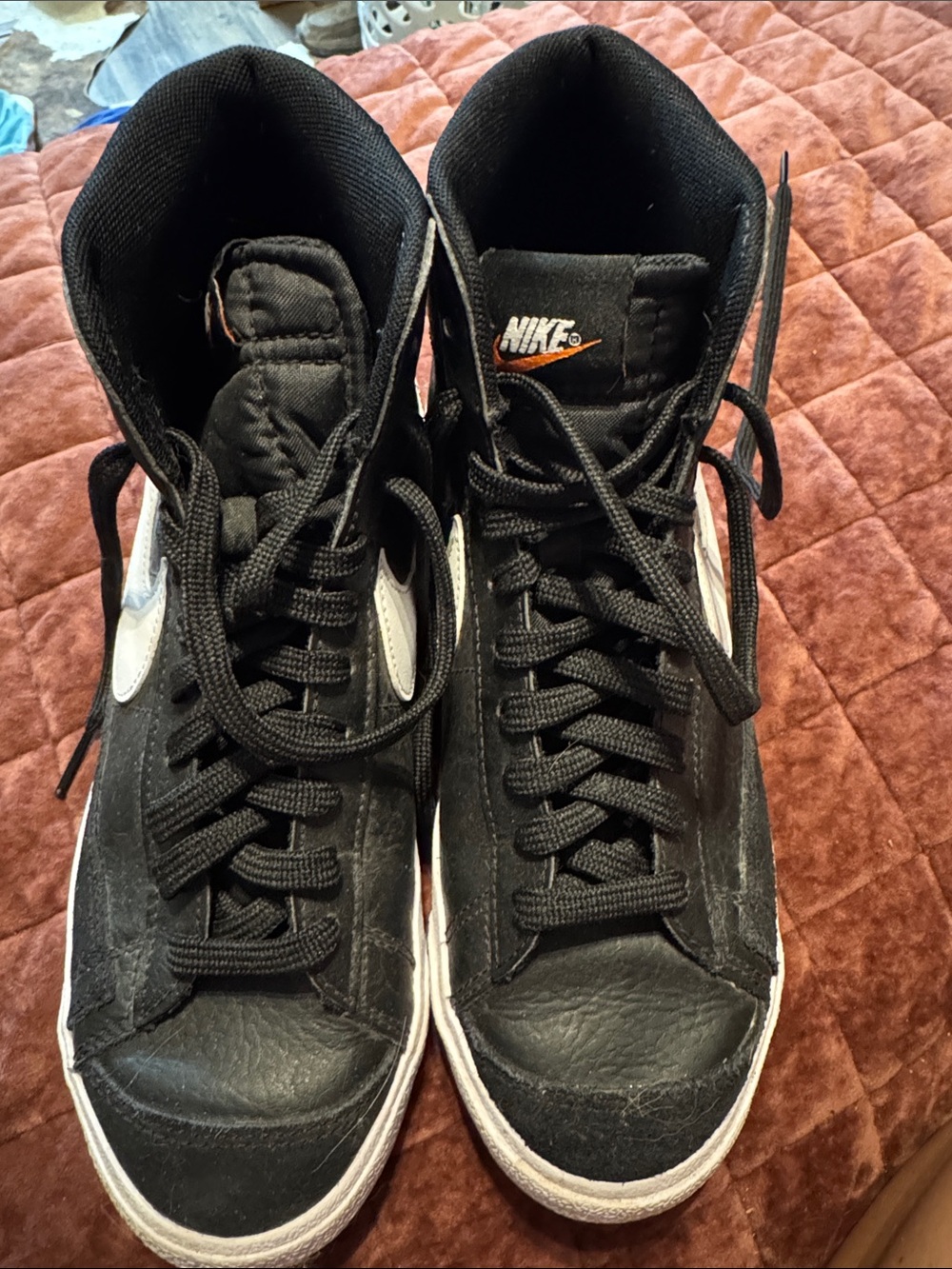 Nike Black and White High-Top Sneakers Nike Blazer Mid ’77s in black/white.